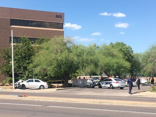 Car strikes, seriously hurts adult, child in Phoenix