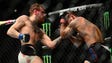 McGregor lands a hard left hand against Mendes at UFC