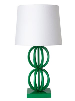 This photo provided by Land of Nod shows a Two Ring Table Lamp, with shade sold separately.