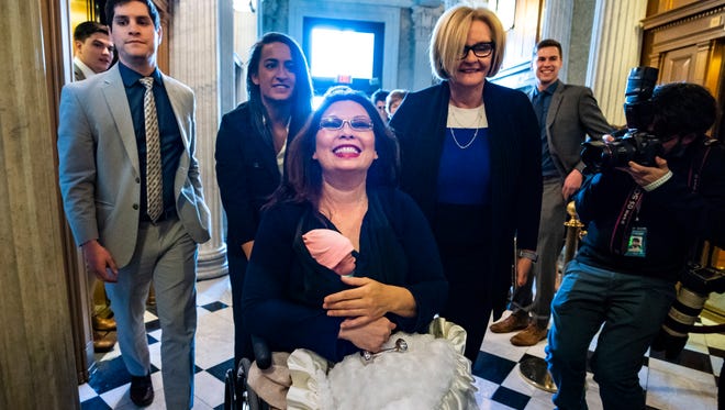 Democratic Senator from Illinois Tammy Duckworth carries her 10-day old daughter Maile Pearl Bowlsbey onto the Senate floor to cast her vote against James Bridenstine to be the next NASA administrator in the US Capitol in Washington, DC, USA, 19 April 2018. It is the first time in Senate history that a baby has been allowed on the Senate floor for a vote.