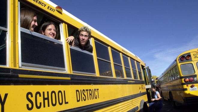 Dayton High School students on their school bus.