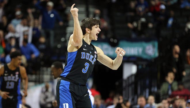 Duke guard Grayson Allen (3) reacts after a three-point shot against North Carolina.