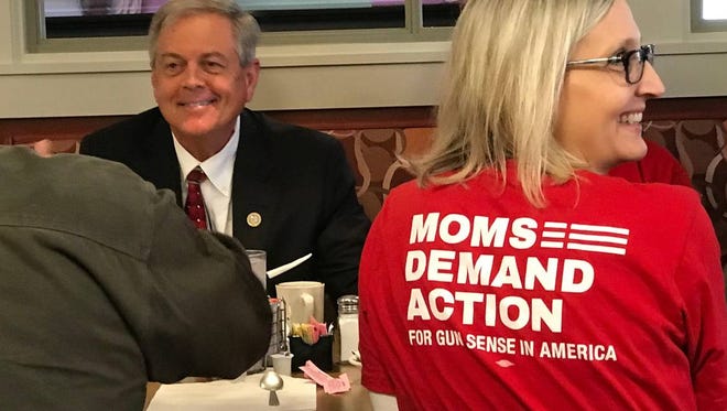 Congressman Ralph Norman put his loaded gun on a Rock Hill Diner table to 'make a point' about guns Friday morning.