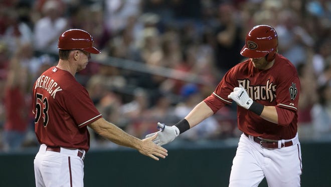 Diamondbacks' Nolan Reimold rounds the bases after hitting a two-run home run off of Jorge De La Rosa in the seventh inning at Chase Field in Phoenix, AZ on Saturday, August 31, 2014.