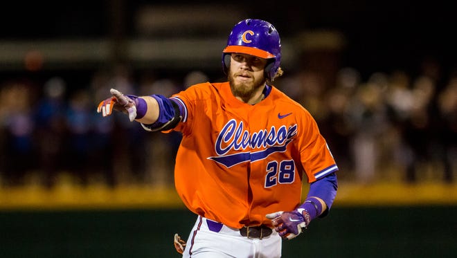 Clemson Tigers right fielder Seth Beer (28) rounds the bases following his two-run homer against the South Carolina Gamecocks during the sixth inning at Founders Park.