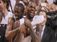 LeBron James (6) celebrates with Dwyane Wade (3) after