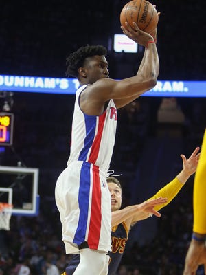Pistons forward Stanley Johnson scores against Cavaliers guard Matthew Dellavedova during the second period of Game 3 of the Eastern Conference quarterfinals Friday at the Palace.