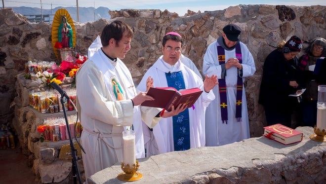 Bishop Oscar Cantú performs the Catholic Mass on the top of Tortugas “A” Mountain on Friday morning. Hundreds of people converged on the mountain as part of Tortugas Pueblo’s three day Our Lady of Guadalupe Fiesta.