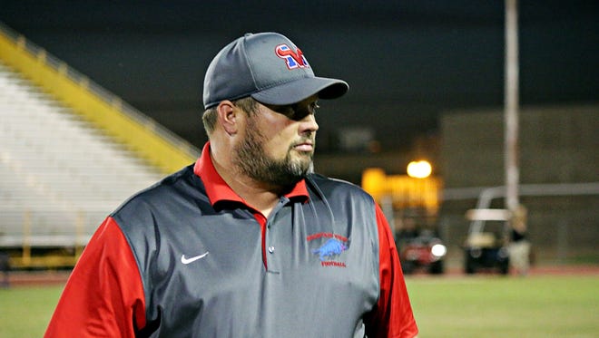 Mesa Mountain View freshman football coach Crys Hollen collapsed and lost consciousness at a passing competition in June 2017.