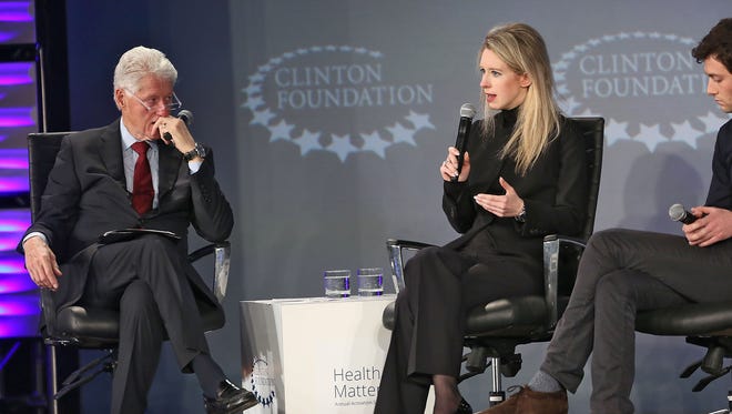 Former President Bill Clinton listens as Theranos CEO Elizabeth Holmes speaks at the Clinton Foundation Health Matters Summit in Indian Wells Monday. With an eye toward innovation, Clinton told a crowd of more than 400 that the Health Matters-model is the way to fix things.
President Bill Clinton listens as Theranos CEO Elizabeth Holmes speaks at the Clinton Foundation Health Matters Summit in Indian Wells, January 26, 2015.