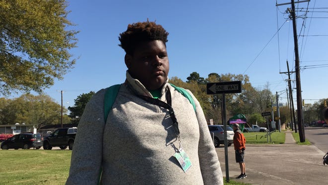 Trevion Breaux, a Lafayette High freshman, participated in a walkout at the school Wednesday morning.