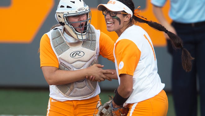 At left Tennessee's Abby Lockman (44) and Tennessee's Matty Moss (1) celebrate at the end of an inning during an NCAA Super Regional game between Tennessee and Texas A&M at Sherri Parker Lee Stadium on Friday, May 26, 2017. Tennessee defeated Texas A&M 8-1.