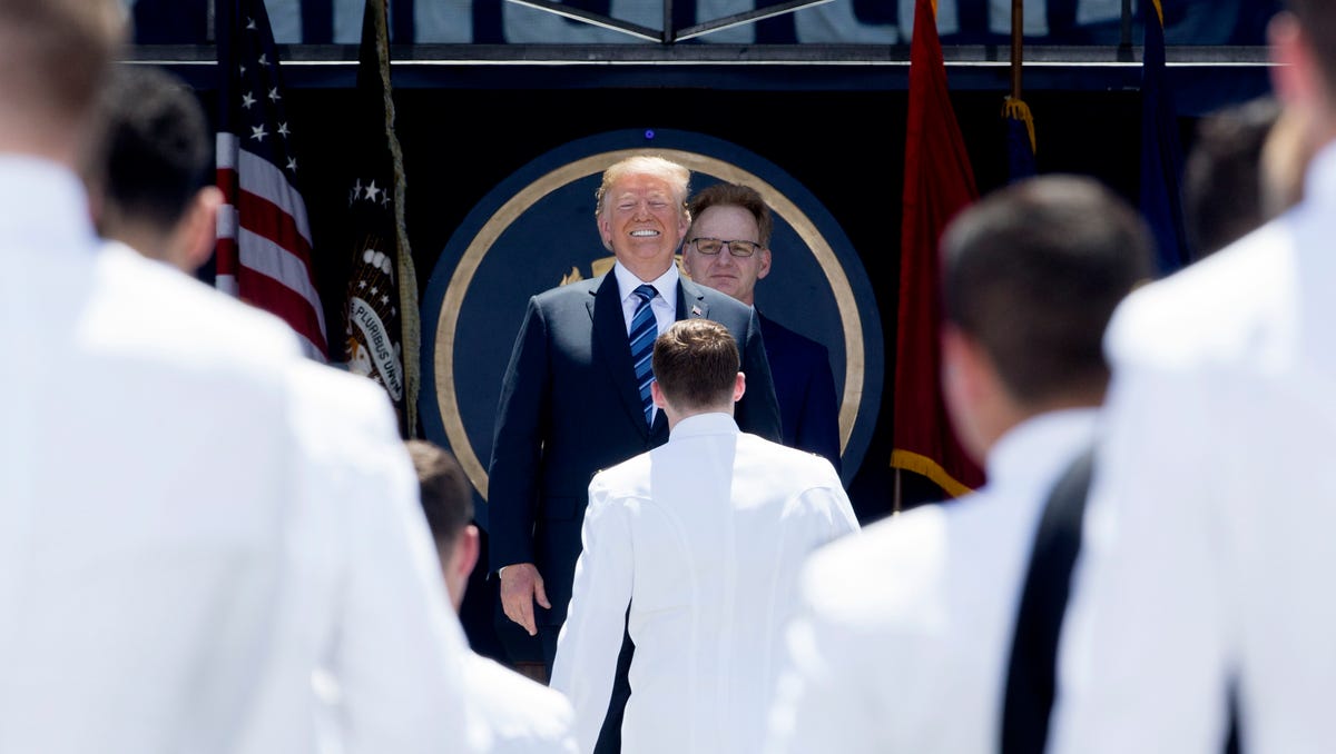 President Trump congratulates graduates during the United States Naval Academy Graduation and Commissioning Ceremony, at Navy-Marine Corps Memorial Stadium in Annapolis, Md., May 25, 2018.