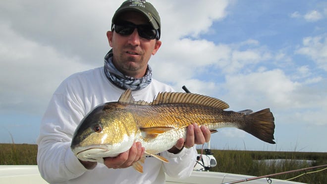 Kevin Ruefly found fly fishing to be very productive in the marshes while fishing with Sonny Schindler of Shore Thing Charters.