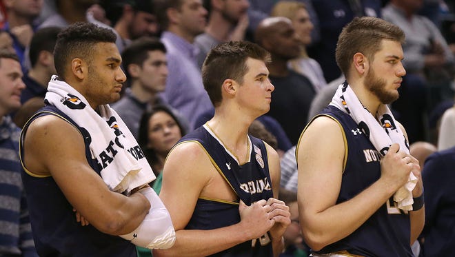 Players on the Notre Dame Fighting Irish bench show disappointment as they lost to the Purdue Boilermakers in the Crossroads Classic at Bankers Life Fieldhouse in Indianapolis, Saturday, Dec. 17, 2016.