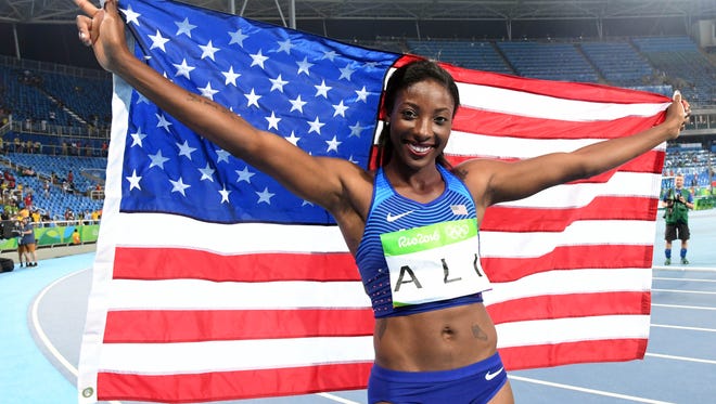 Aug 17, 2016; Rio de Janeiro, Brazil; Nia Ali (USA) poses for a photo after placing second during the women's 100m hurdles final in the Rio 2016 Summer Olympic Games at Estadio Olimpico Joao Havelange. Mandatory Credit: Kirby Lee-USA TODAY Sports