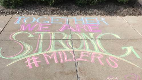 Encouraging chalk art lined the sidewalks around Noblesville West Middle School as students returned to school for the first time since the May 25, 2018 shooting.