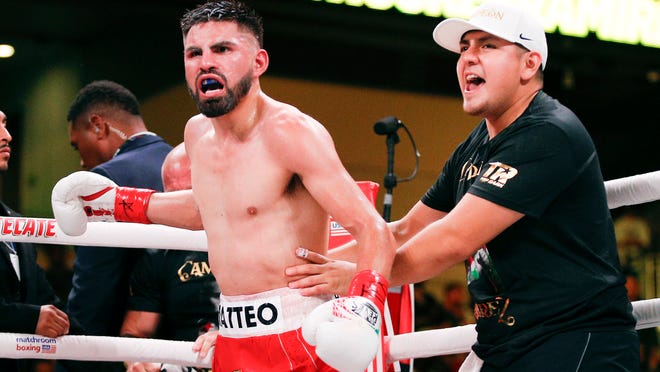 Jose Ramirez celebrates his TKO victory over Maurice Hooker on July 27, 2019, in Arlington, Texas.