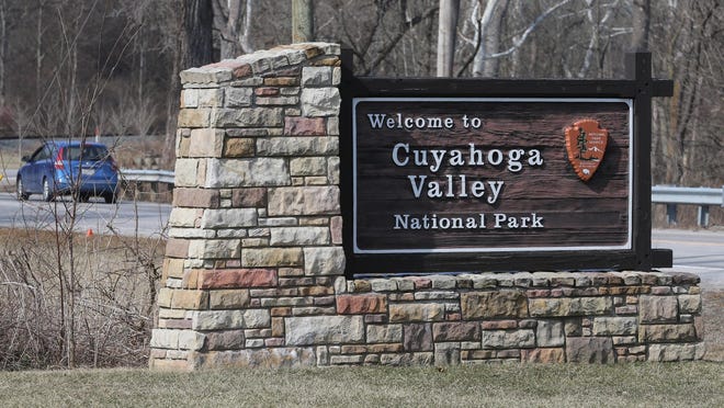 A sign along Riverview Road welcomes visitors to Cuyahoga Valley National Park.