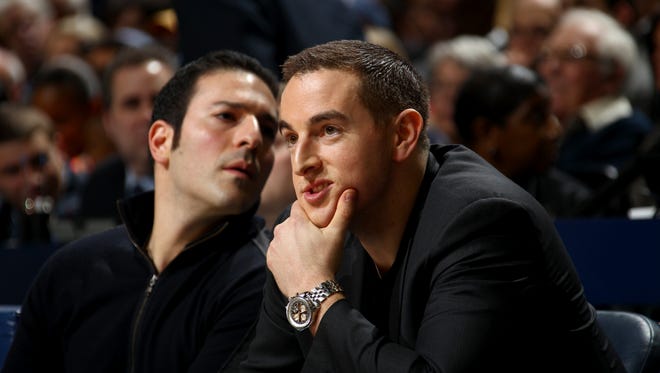 December 26, 2014 -  Memphis Grizzlies controlling owner Robert Pera  watches the game against the Houston Rockets at FedExForum. (Nikki Boertman/The Commercial Appeal)