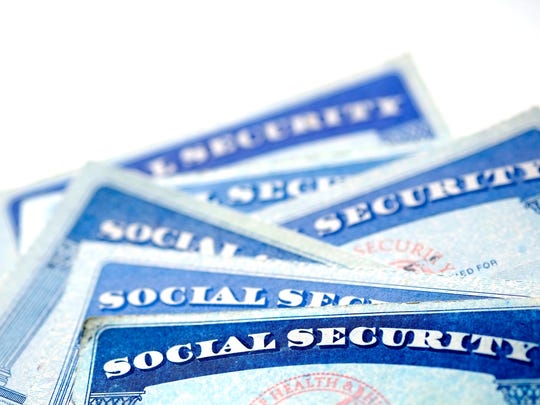 A messy pile of Social Security cards.