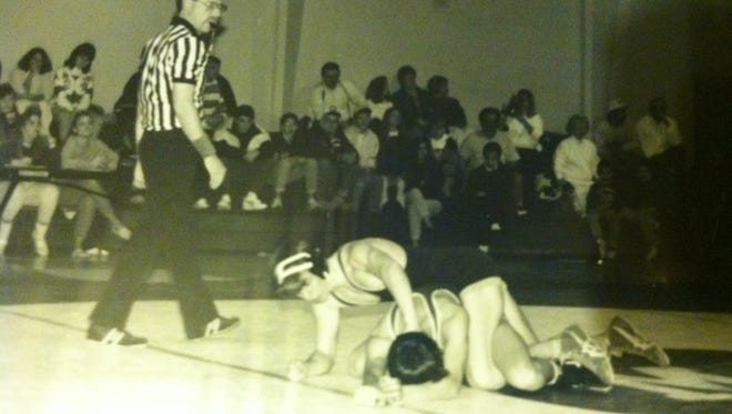 Pat Smith (top) is shown pinning a wrestler from Shore Regional during his senior season at Mater Dei Prep