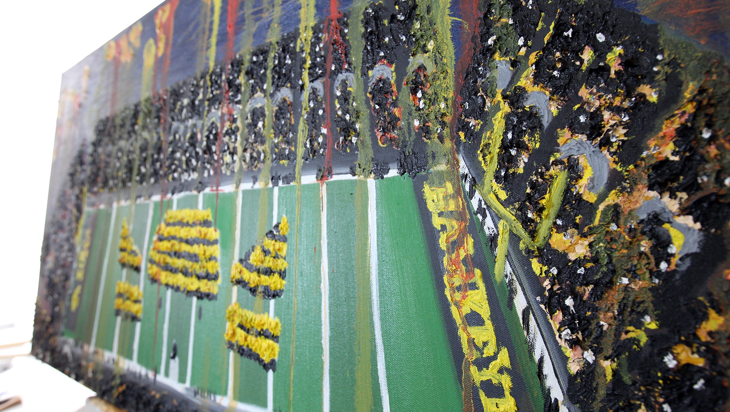 Heidi Schickel's painting of Kinnick Stadium is pictured at the UI Visual Arts Building on Thursday, Dec. 22, 2016.