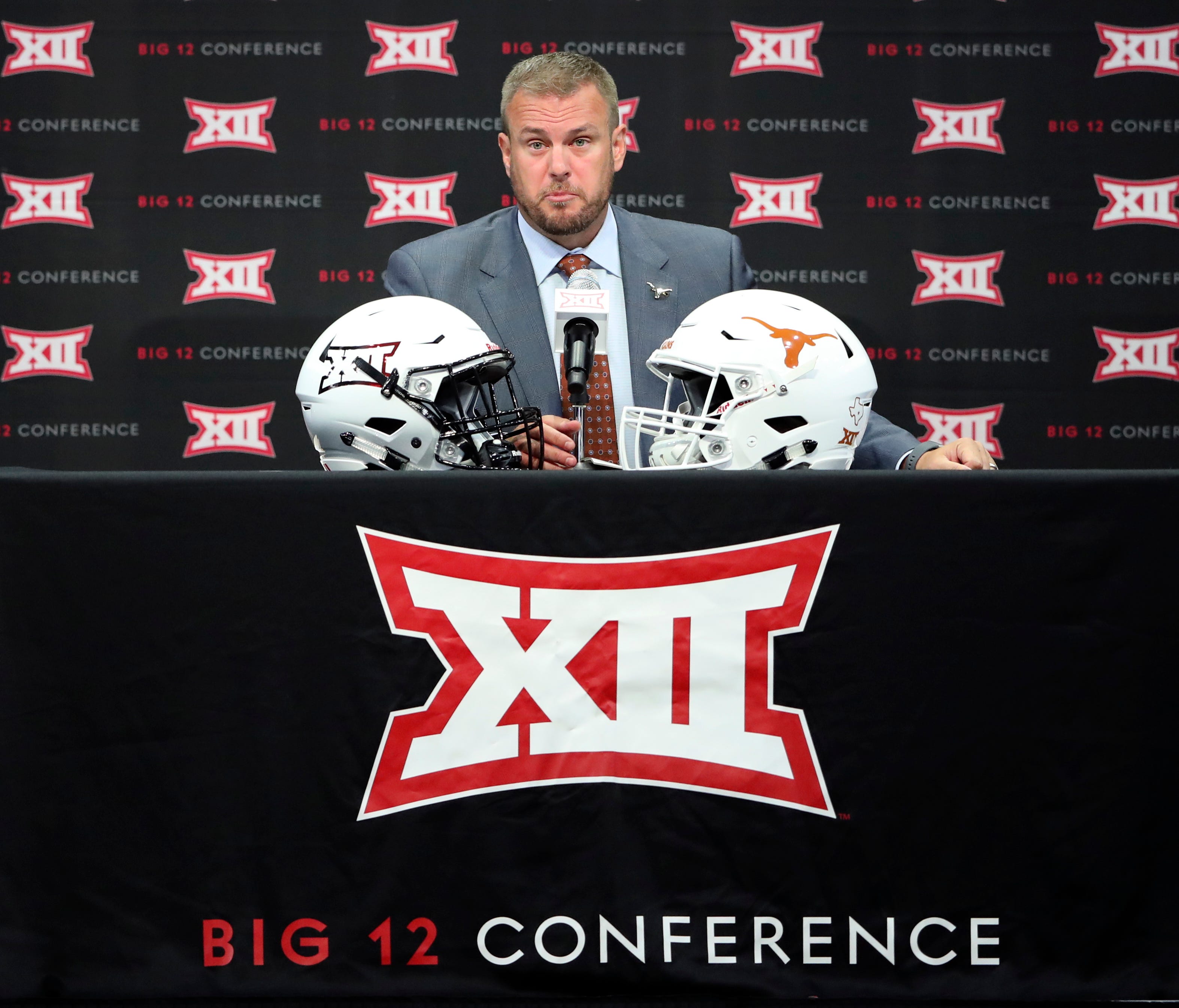 Texas coach Tom Herman speaks to the media during Big 12 football media days in Frisco, Texas.