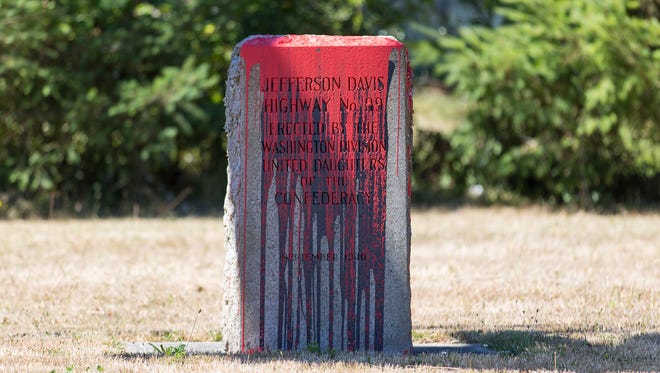 Jefferson Davis highway markers were vandalized at Jefferson Davis Park Friday, Aug. 18, 2017 in Ridgefield, Wash.