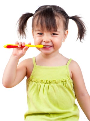 Teaching good dental habits should start young.