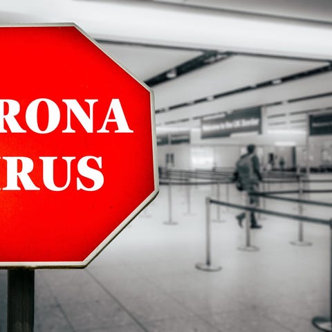 Coronavirus on a stop sign at an airport