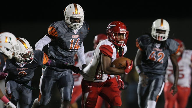 Game action and scenes from Friday's game between Dunbar and Immokalee High School at Dunbar High School in Fort Myers. Dunbar beat Immokalee 41-26. 