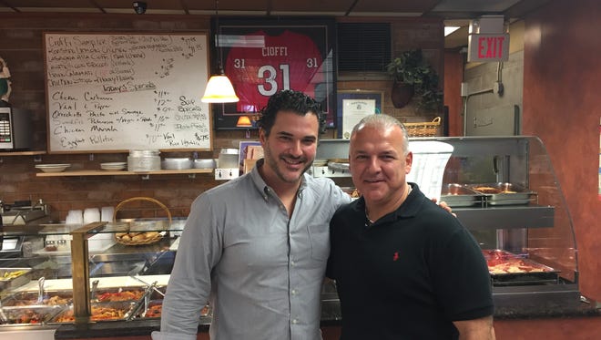 
Joey Cioffi, left, and Jerry Cioffi, right, own and operate Cioffi’s in Springfield. Rutgers cornerback Anthony Cioffi is Joey’s nephew and Jerry’s son. 
