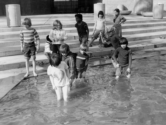 In this 1977 photo, kids get their feet wet in the
