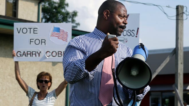 AP
In this photo taken on Monday, Aug. 4, 2014, former Philadelphia Eagles NFL football player Garry Cobb, a Republican Congressional candidate in New Jersey's 1st Congressional District, uses a bull horn to address a gathering in Cherry Hill, N.J. (AP Photo/Mel Evans) In this photo taken on Monday, Aug. 4, 2014, former Philadelphia Eagles NFL football player Garry Cobb, a Republican Congressional candidate in New Jersey's 1st Congressional District, uses a bull horn to address a gathering in Cherry Hill, N.J. (AP Photo/Mel Evans)
