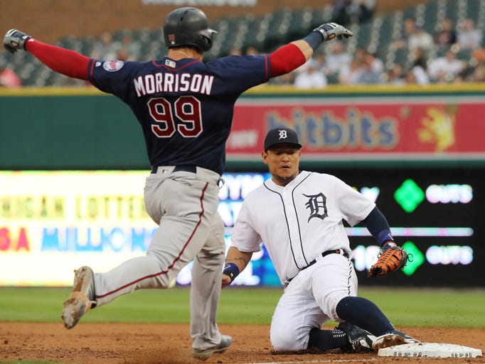 Detroit Tigers first baseman Miguel Cabrera, right,