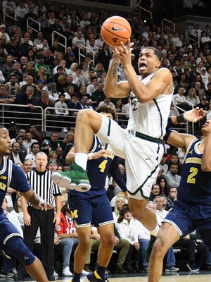 Miles Bridges drives into the paint against UM during the first half Saturday, Jan. 13, 2018, at the Breslin Center in East Lansing.