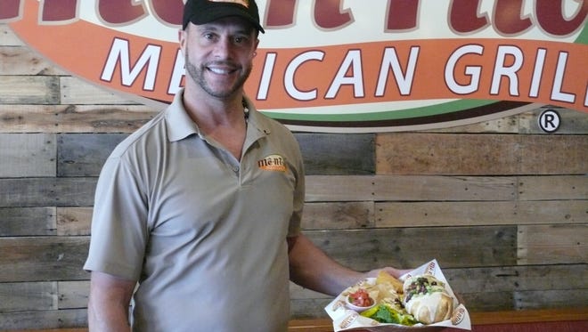 Jack Souto recently opened Me -n-Tito's Mexican Grill on Babcock Street in Melbourne.