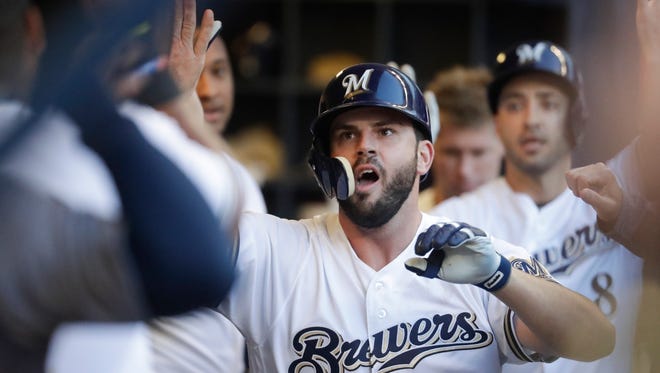 Mike Moustakas celebrates his two-run home run during the first inning.