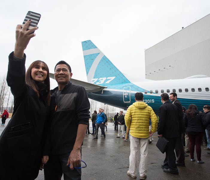 Boeing employees get their first look at the company's latest jet, the 737 Max 7, at the company's Renton, Wash., factory on Feb. 5, 2018.