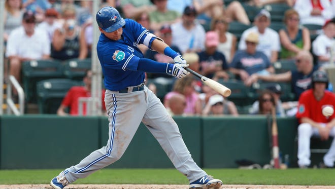 Rocky Mountain graduate Andy Burns, shown in a file photo with the Toronto Blue Jays, has 10 home runs in June for the Lotte Giants of the Korea Baseball Organization.