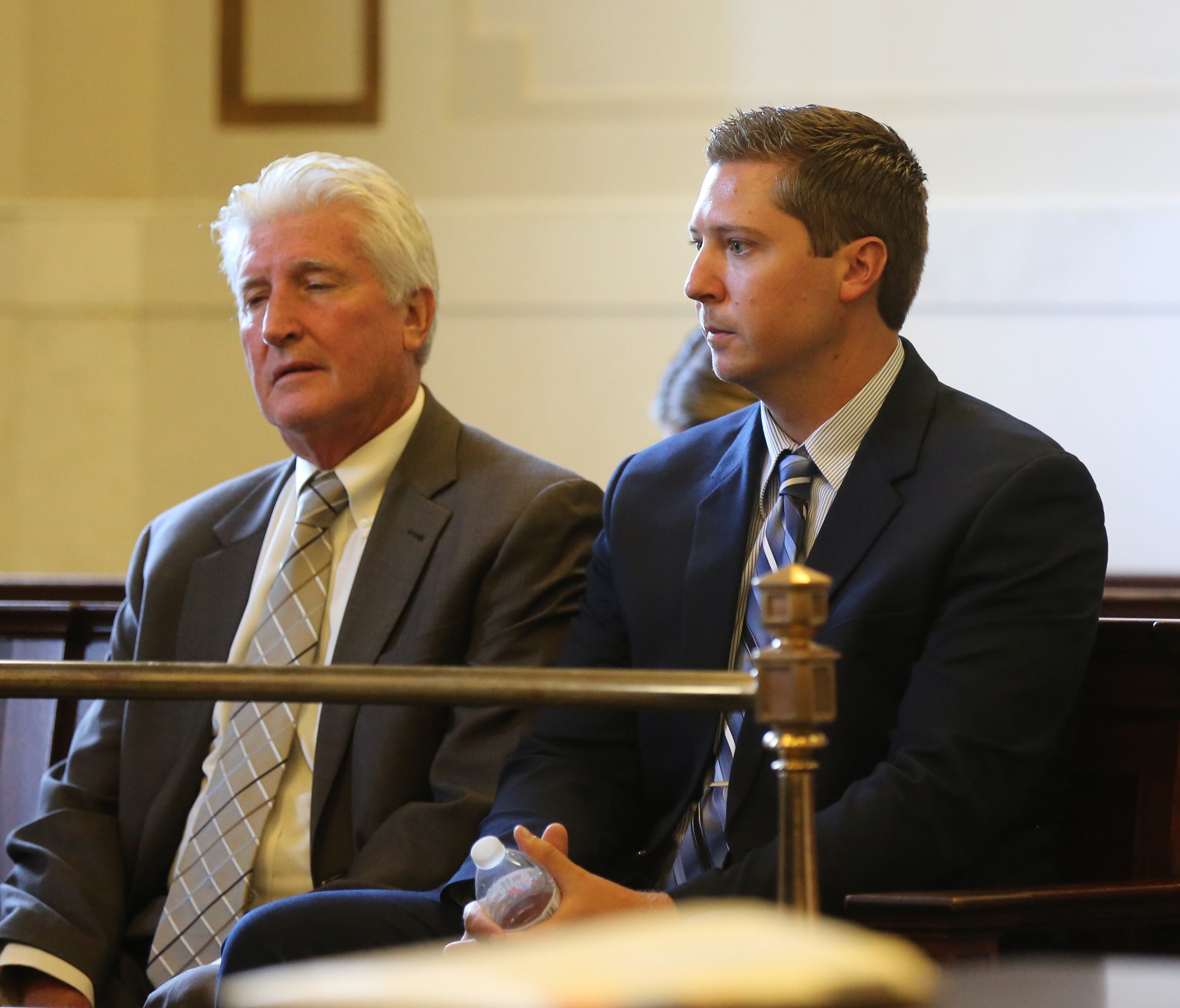 Ray Tensing (right) sits with his attorney Stew Mathews Monday morning ahead of a hearing.