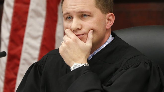 Judge Greg Pinski presides over a hearing in the 8th Judicial District.