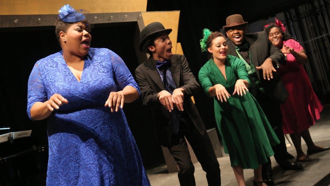 Cast members from the Renaissance Theatre's production of "Ain't Misbehavin'" rehearse a scene. The play will run from April 12-15.