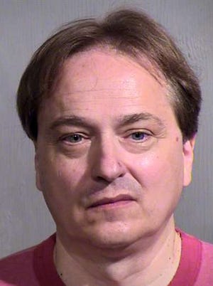 Peter Steinmetz was arrested July 28 for carrying a rifle at Phoenix Sky Harbor International Airport.