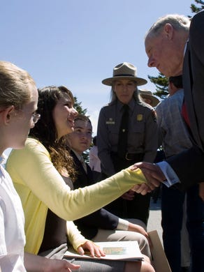Gov. Phil Bredesen, right, greets, from left, Hannah Clevenger of Gatlinburg Pittman, Mia Wallace of West High School, and Grant Fisher of Pi Beta Phi Elementary Friday, April 24, 2009 at Clingmans Dome in the Great Smoky Mountains National Park. The three students led the Pledge of Allegiance and are winners of the East Tennessee National History Day competition.