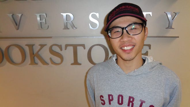 Haoxin Li, shown on the Binghamton University campus, is a volunteer tutor for Broome County HEARS. He enjoys helping people who are working on earning their high school equivalency diploma.