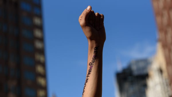 Lorenzo Rulli, 22, of McKees Rocks, Pennsylvania, holds