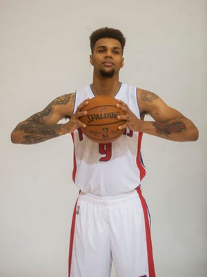 The Pistons' Michael Gbinije poses during media day at the Pistons' practice facility in Auburn Hills on Monday.