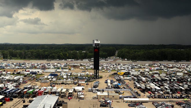 Rain moves in during the NASCAR Sprint Cup Series Quicken Loans 400 at Michigan International Speedway on June 14, 2015, in Brooklyn.